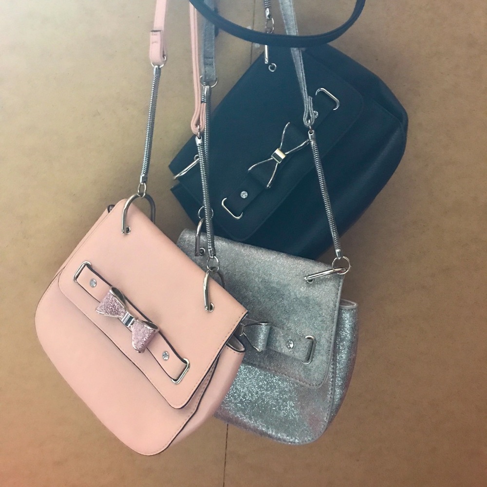Candie’s crossbody purses w/ metal bow